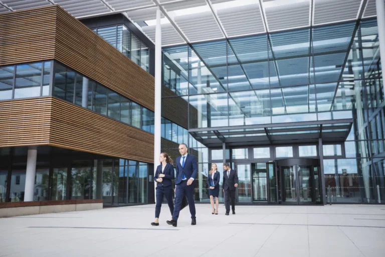 business-people-walking-outside-office-building_10